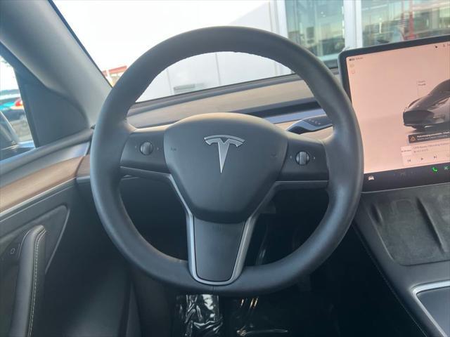 used 2023 Tesla Model Y car, priced at $30,000