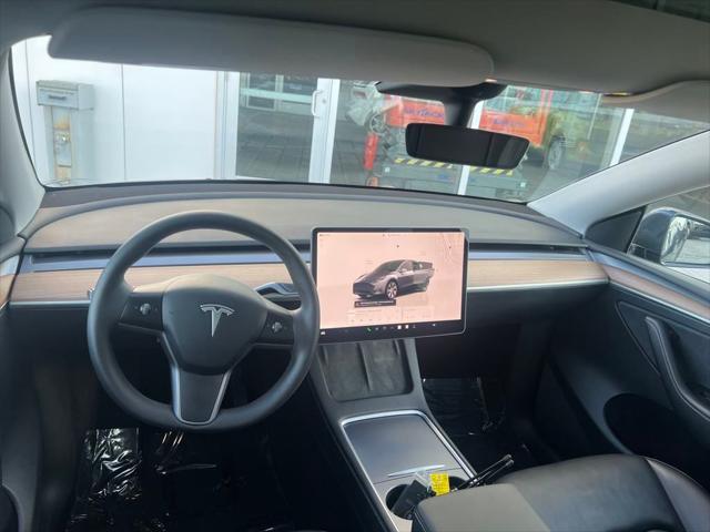 used 2023 Tesla Model Y car, priced at $30,000