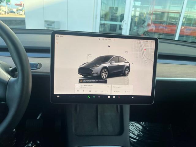used 2023 Tesla Model Y car, priced at $30,000