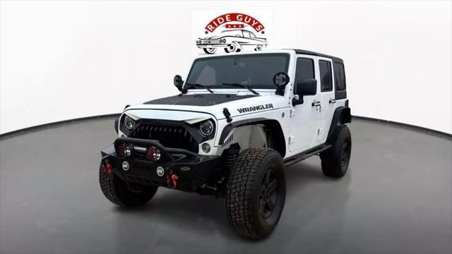 used 2017 Jeep Wrangler Unlimited car, priced at $21,375