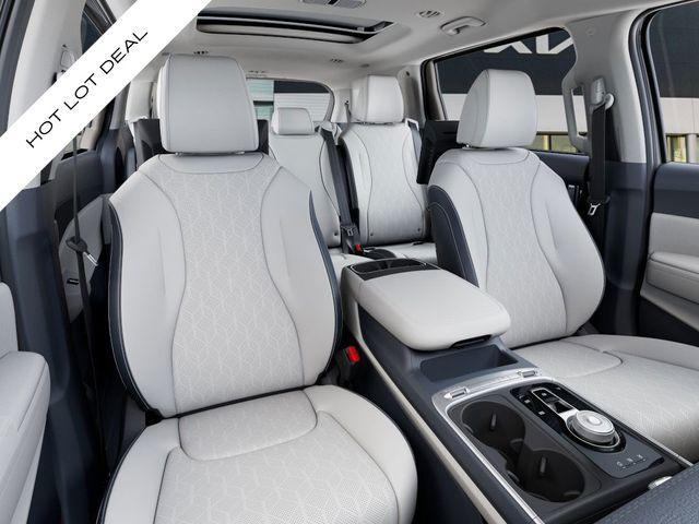 new 2025 Kia Carnival Hybrid car, priced at $49,592