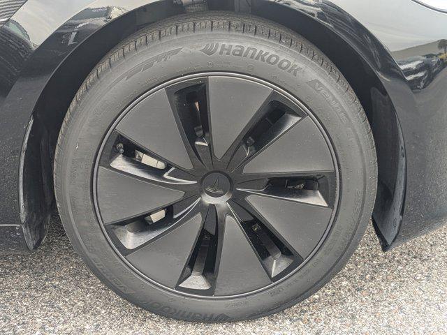 used 2024 Tesla Model 3 car, priced at $30,594