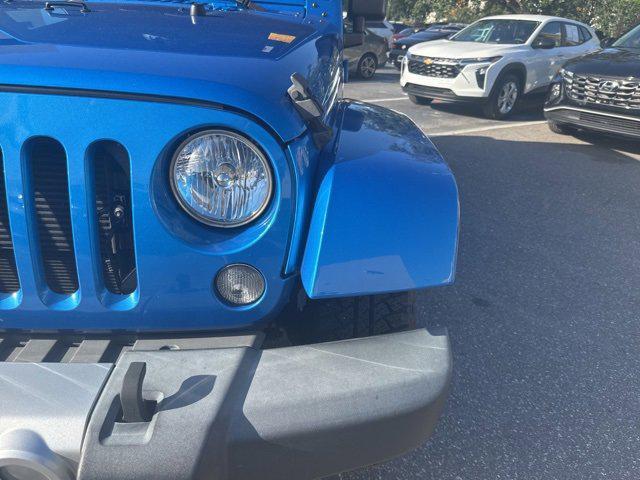 used 2015 Jeep Wrangler Unlimited car, priced at $17,694