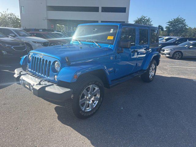 used 2015 Jeep Wrangler Unlimited car, priced at $17,694