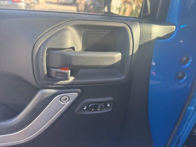 used 2015 Jeep Wrangler Unlimited car, priced at $17,694
