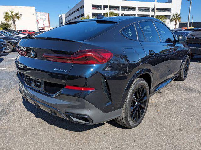 used 2022 BMW X6 car, priced at $58,994