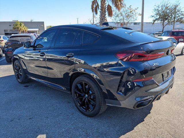 used 2022 BMW X6 car, priced at $58,994