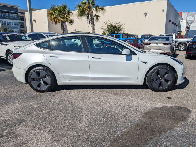 used 2023 Tesla Model 3 car, priced at $27,777