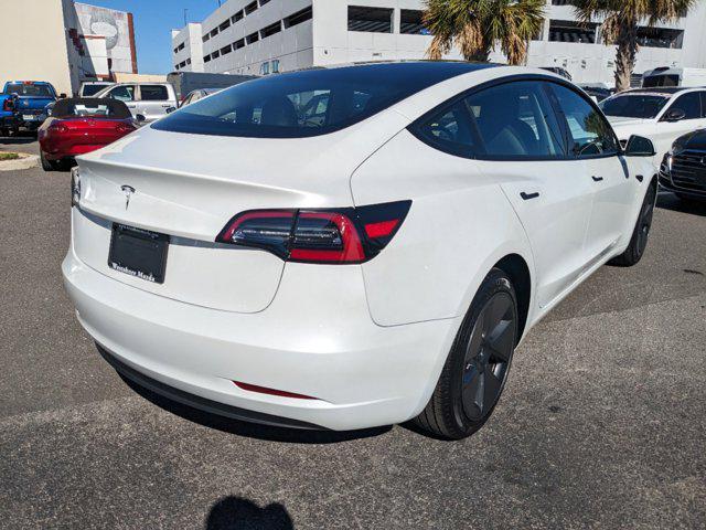 used 2023 Tesla Model 3 car, priced at $27,777