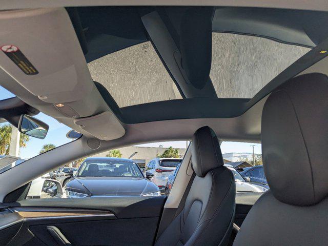 used 2023 Tesla Model 3 car, priced at $27,777