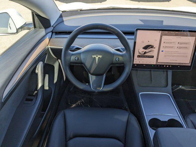 used 2023 Tesla Model 3 car, priced at $27,777