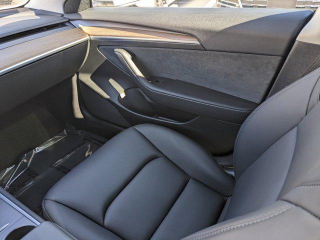 used 2023 Tesla Model 3 car, priced at $27,777