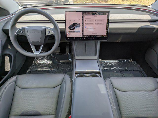 used 2024 Tesla Model 3 car, priced at $30,994