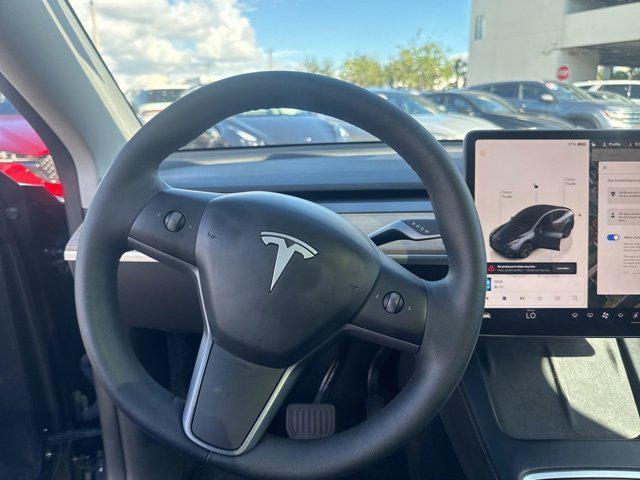 used 2025 Tesla Model Y car, priced at $38,994