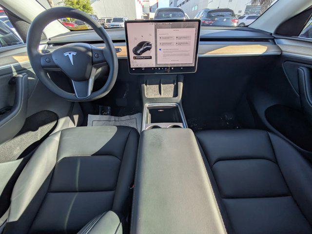 used 2025 Tesla Model Y car, priced at $36,994