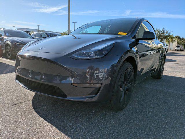 used 2025 Tesla Model Y car, priced at $36,994