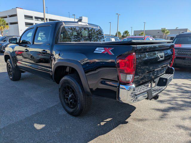 used 2023 Toyota Tacoma car, priced at $31,394