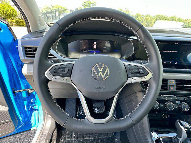 new 2024 Volkswagen Taos car, priced at $29,678