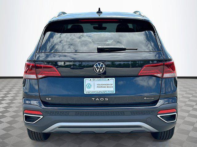 new 2024 Volkswagen Taos car, priced at $29,699