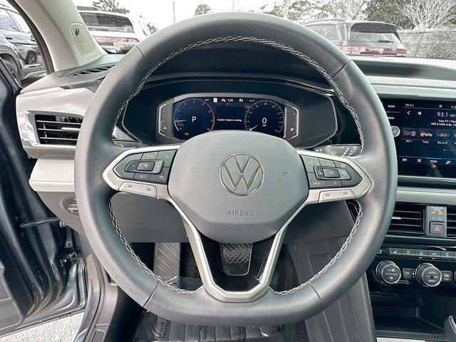 used 2024 Volkswagen Taos car, priced at $28,000