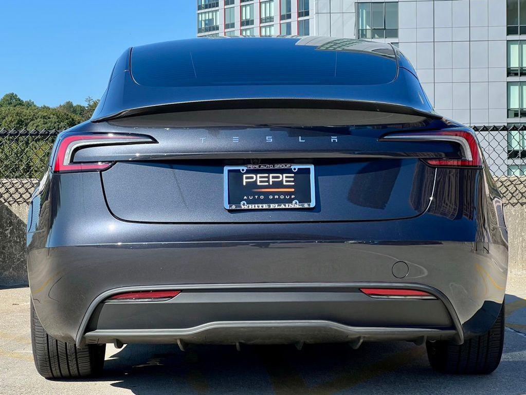 used 2025 Tesla Model 3 car, priced at $34,945