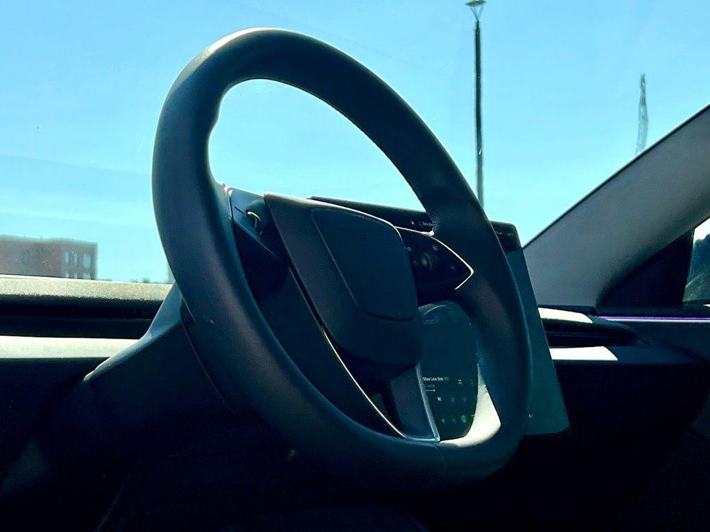 used 2025 Tesla Model 3 car, priced at $34,945