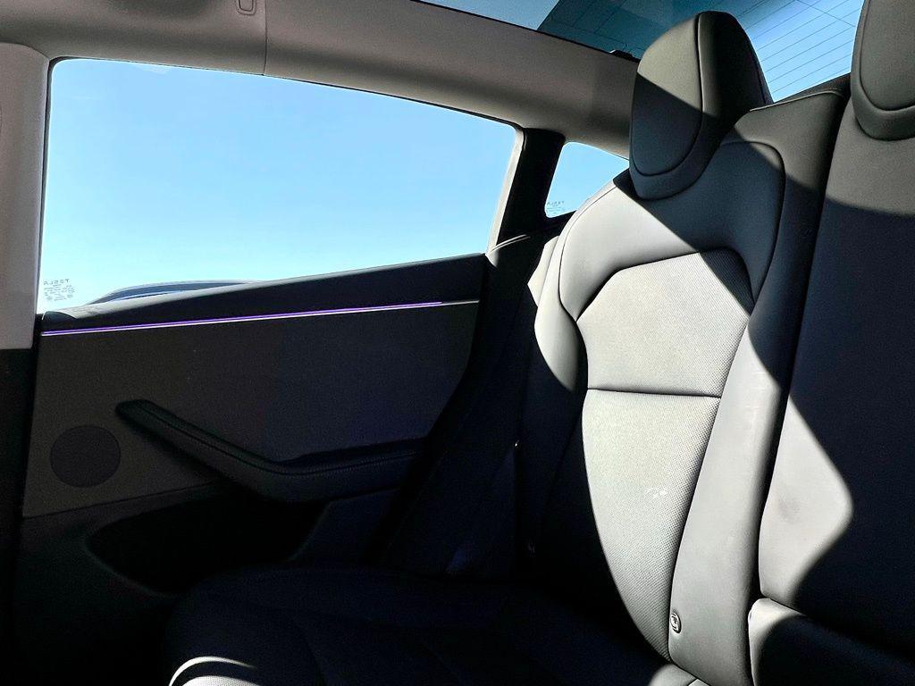 used 2025 Tesla Model 3 car, priced at $34,945