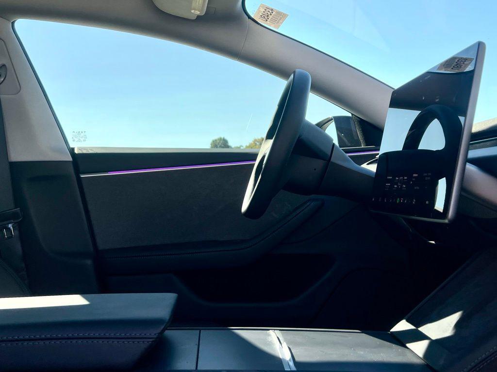 used 2025 Tesla Model 3 car, priced at $34,945