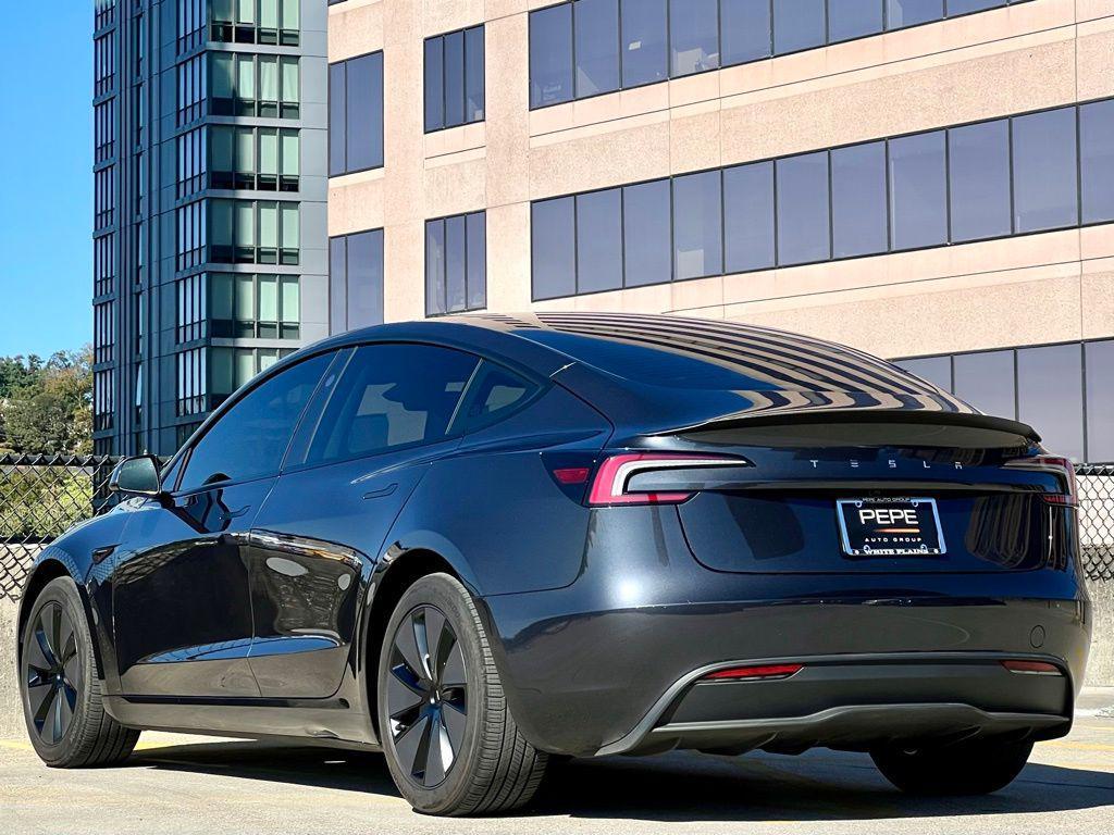 used 2025 Tesla Model 3 car, priced at $34,945