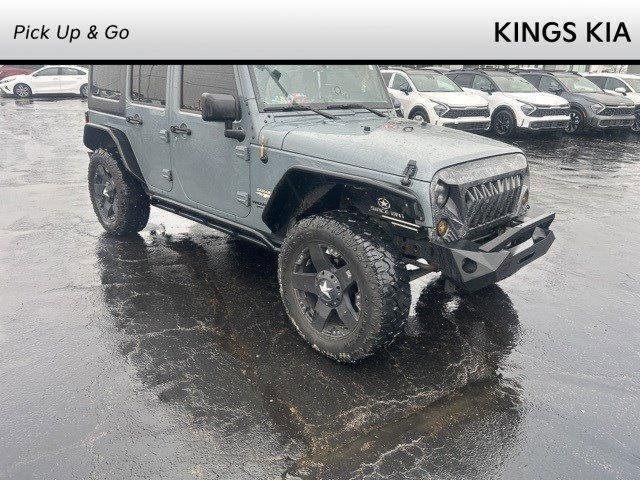 used 2015 Jeep Wrangler Unlimited car, priced at $20,498