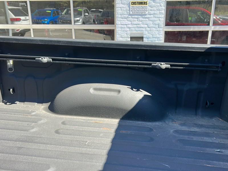 used 2021 Ram 1500 car, priced at $32,490