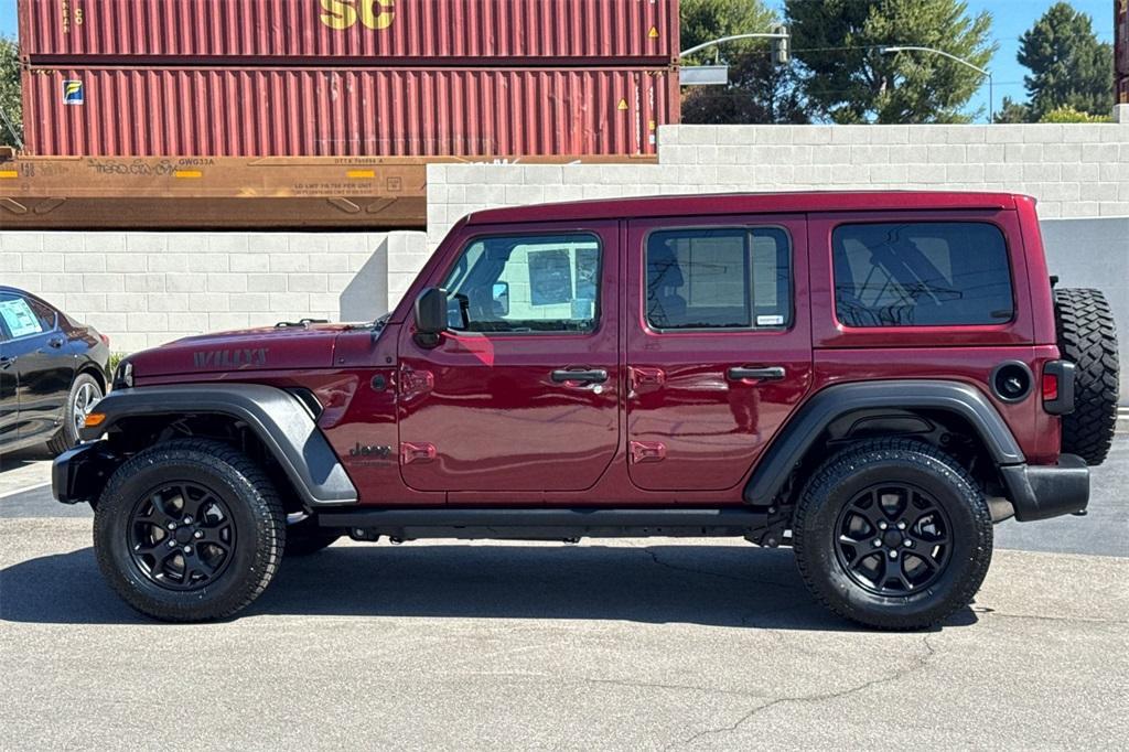 used 2021 Jeep Wrangler Unlimited car, priced at $27,495