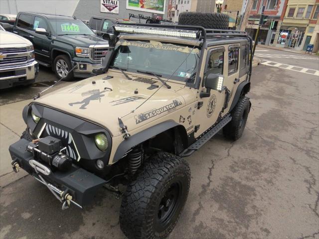 used 2016 Jeep Wrangler Unlimited car, priced at $23,950