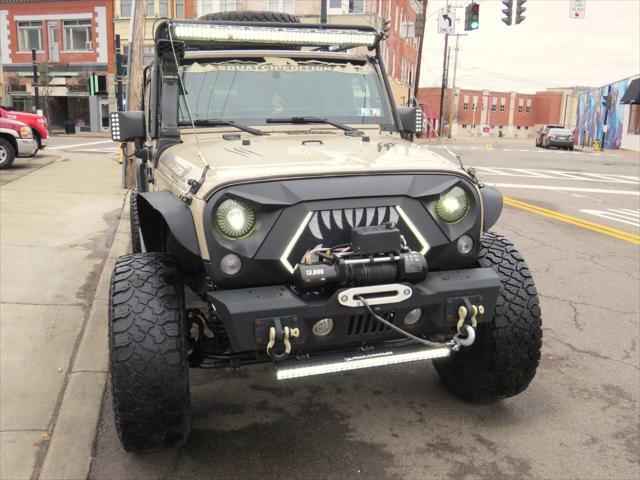 used 2016 Jeep Wrangler Unlimited car, priced at $23,950