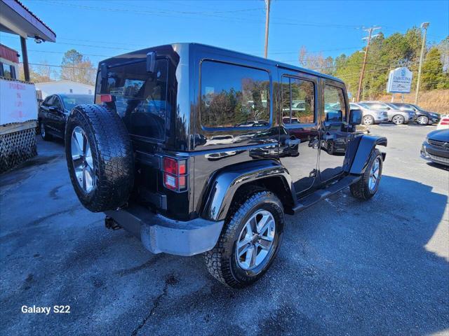 used 2014 Jeep Wrangler Unlimited car, priced at $17,975