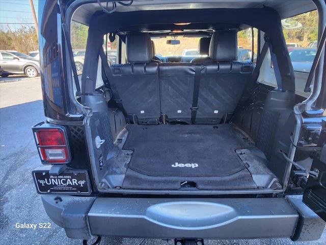 used 2014 Jeep Wrangler Unlimited car, priced at $17,975