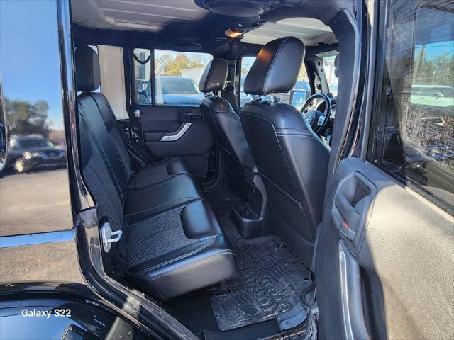 used 2014 Jeep Wrangler Unlimited car, priced at $17,975