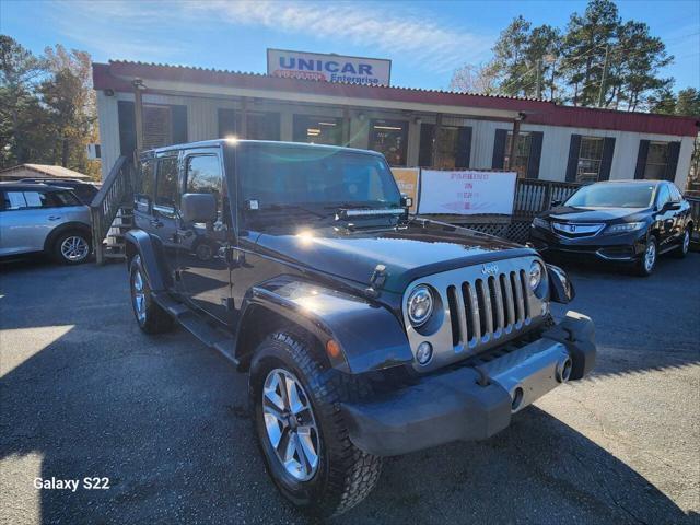 used 2014 Jeep Wrangler Unlimited car, priced at $17,975