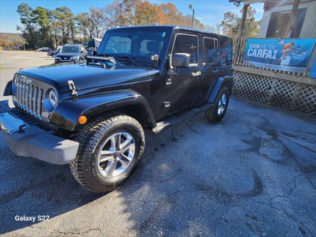 used 2014 Jeep Wrangler Unlimited car, priced at $17,975