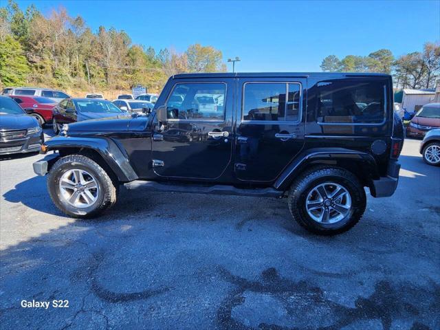 used 2014 Jeep Wrangler Unlimited car, priced at $17,975