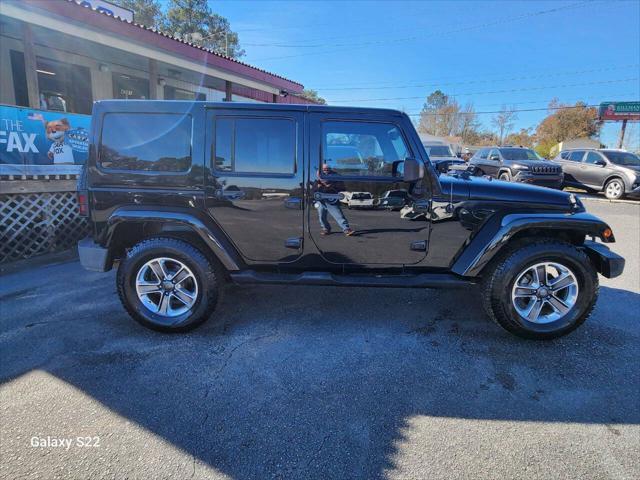 used 2014 Jeep Wrangler Unlimited car, priced at $17,975