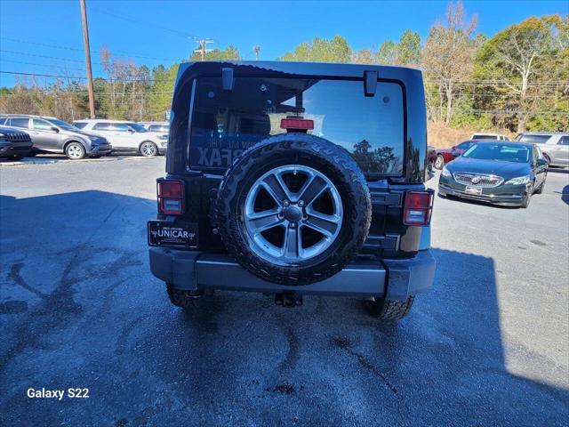 used 2014 Jeep Wrangler Unlimited car, priced at $17,975