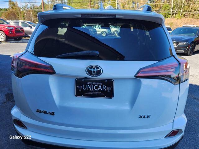 used 2018 Toyota RAV4 car, priced at $17,995