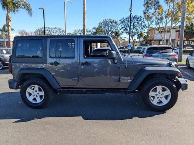 used 2018 Jeep Wrangler JK Unlimited car, priced at $23,998