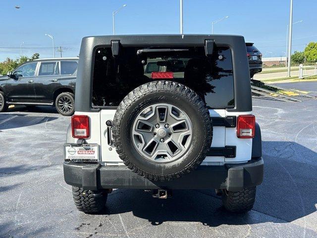 used 2015 Jeep Wrangler Unlimited car, priced at $24,157