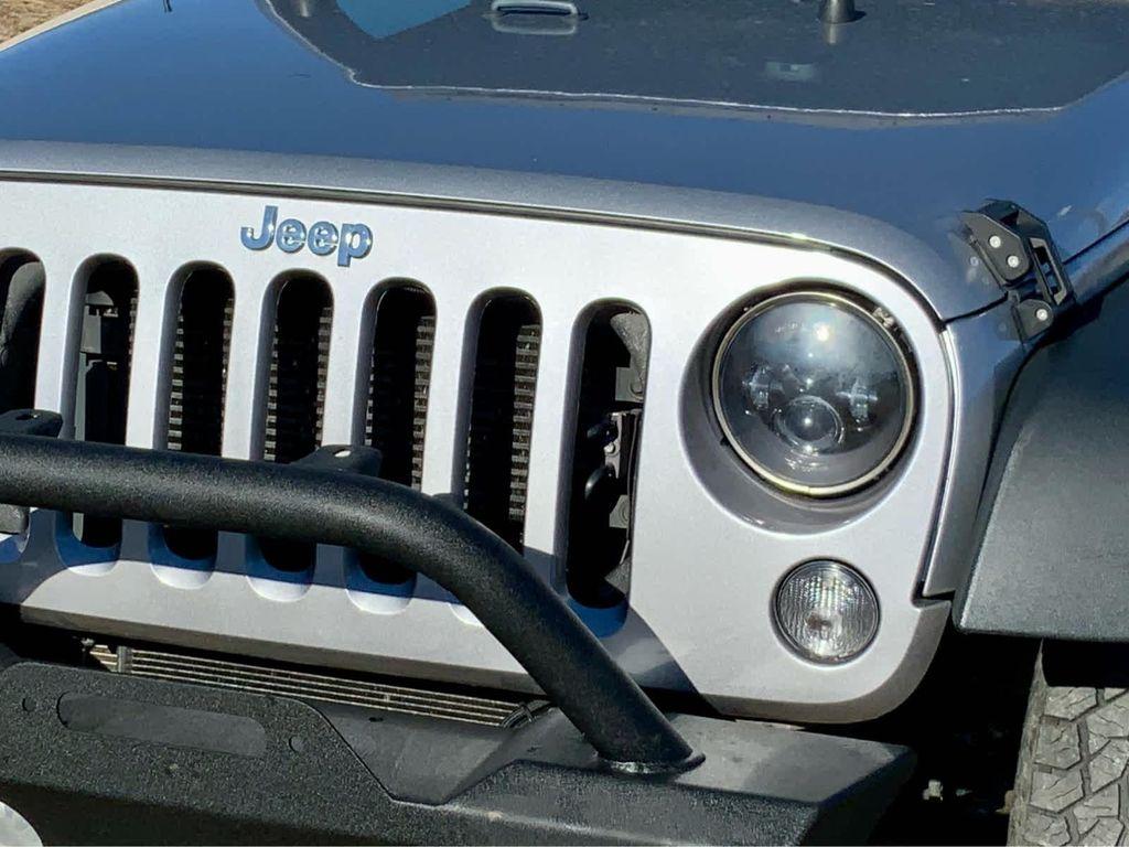 used 2014 Jeep Wrangler Unlimited car, priced at $19,999