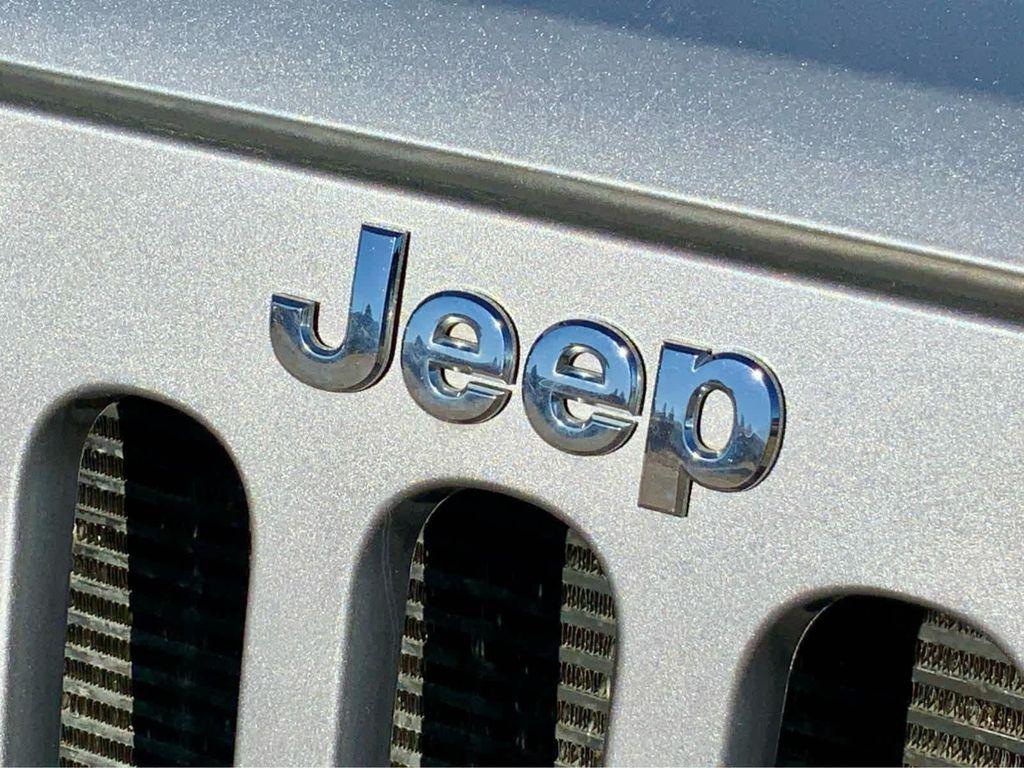 used 2014 Jeep Wrangler Unlimited car, priced at $19,999