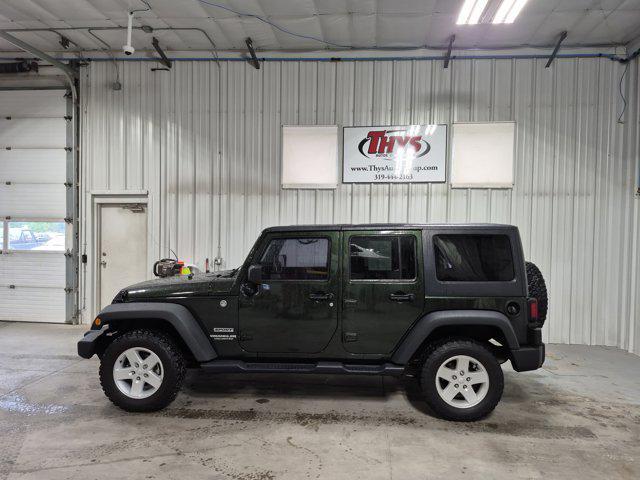used 2011 Jeep Wrangler Unlimited car, priced at $9,995