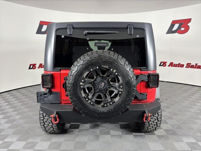 used 2015 Jeep Wrangler Unlimited car, priced at $21,355