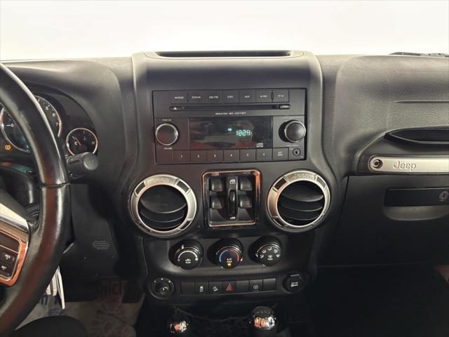 used 2015 Jeep Wrangler Unlimited car, priced at $19,893